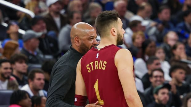 Dec 11, 2023; Orlando, Florida, USA; Cleveland Cavaliers head coach J.B. Bickerstaff talks to guard Max Strus (1) during the second half against the Orlando Magic at Amway Center. Mandatory Credit: Mike Watters-USA TODAY Sports